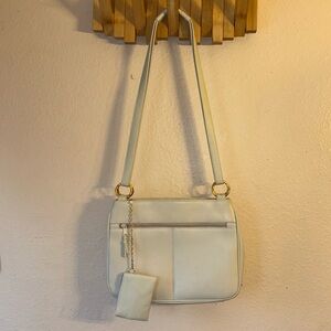 Appleseed’s genuine leather bag cream colored with gold chain and gold link